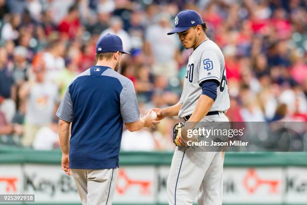 Manager Andy Green of the San Diego Padres removes starting pitcher Dinelson Lamet during the fifth inning against the Cleveland Indians at...