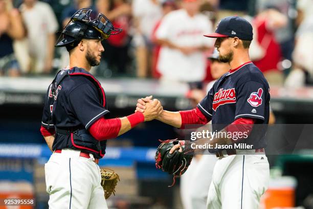 Catcher Yan Gomes celebrates with closing pitcher Shawn Armstrong of the Cleveland Indians after the Indians defeated the San Diego Padres at...