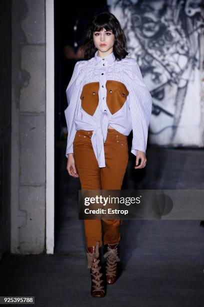 Model walks the runway during the Victoria/Tomas show as part of the Paris Fashion Week Womenswear Fall/Winter 2018/2019 on February 27, 2018 in...