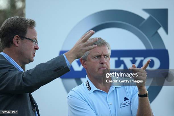 Colin Montgomerie chats with President of Volvo Event Management Per Ericsson during Day Two of the Group Stage of the Volvo World Match Play...