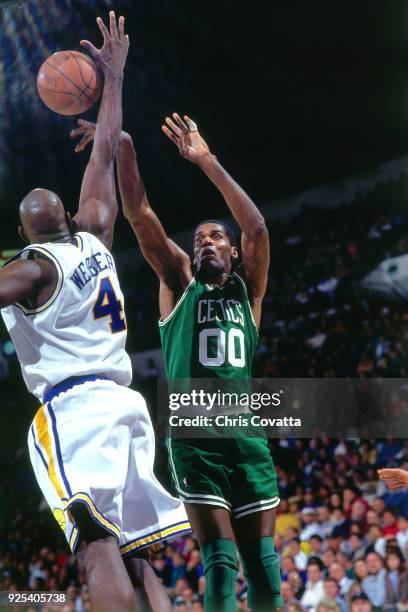 Robert Parish of the Boston Celtics shoots during a game played on February 19, 1994 at the Arena in Oakland in Oakland, California. NOTE TO USER:...
