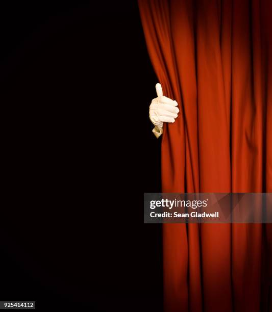 magician show - opening the curtains stock pictures, royalty-free photos & images