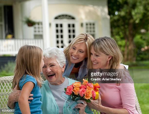 multiple generations celebrating mother's day - muttertag stock-fotos und bilder