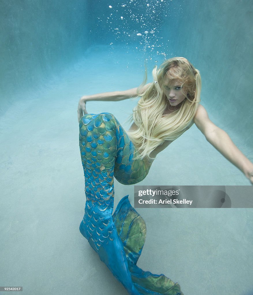 Mermaid Swimming Under Water