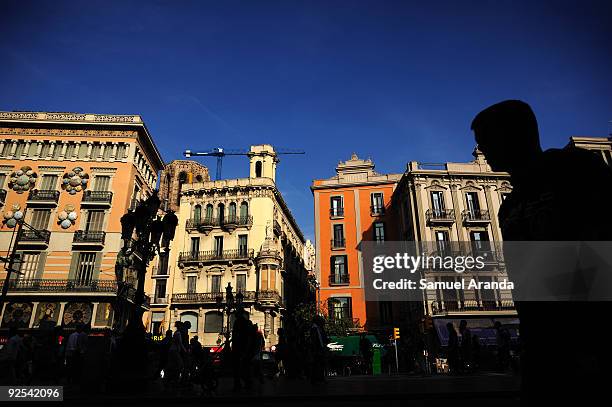 View of "La Rambla" street on October 29, 2009 in Barcelona, Spain. "La Rambla" is a street in central Barcelona, a 1.2 kilometer-long tree-lined...