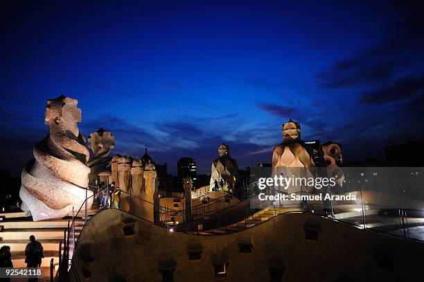 Night view at the roof of "La Pedrera" building on October 30, 2009 in Barcelona, Spain. Casa Mila, better known as La Pedrera , is a building...