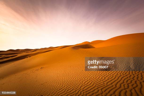 wave pattern desert landscape at sunset, oman - middle east desert stock pictures, royalty-free photos & images