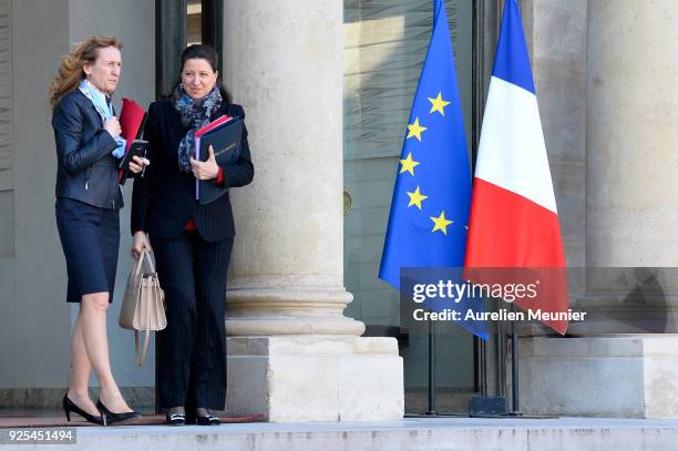 French Justice Minister Nicole Belloubet and French Health and Solidarity Minister Agnes Buzyn leave the Elysee Palace after the weekly cabinet...