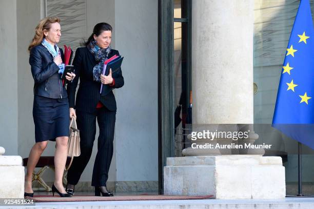 French Justice Minister Nicole Belloubet and French Health and Solidarity Minister Agnes Buzyn leave the Elysee Palace after the weekly cabinet...