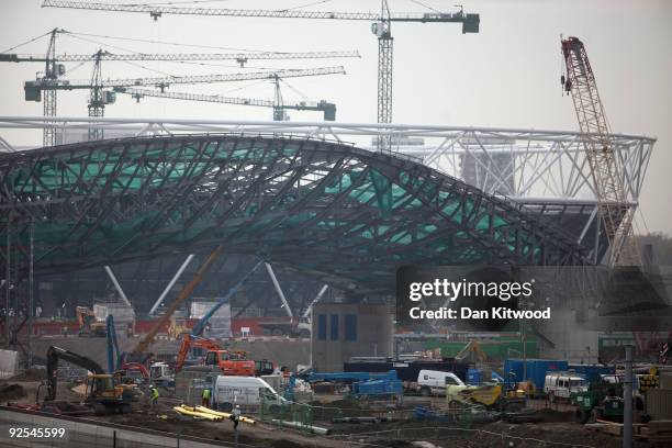 General view of the aquatics centre in front of the main stadium at the Olympic site in Stratford on October 30, 2009 in London, England. Tomorrow...