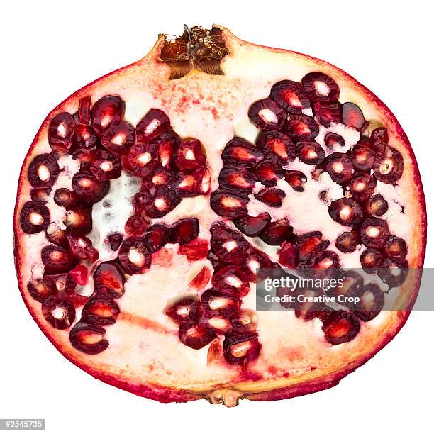 pomegranate cut in half - bisected 個照片及圖片檔