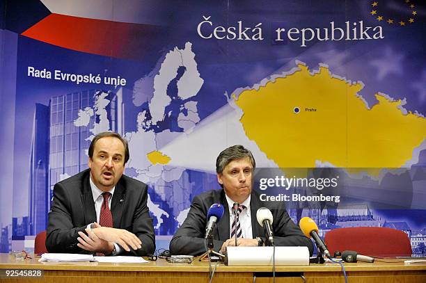 Jan Kohout, Czech Republic's foreign minister, left, speaks as Jan Fischer, prime minister of the Czech Republic, listens, during a news conference...