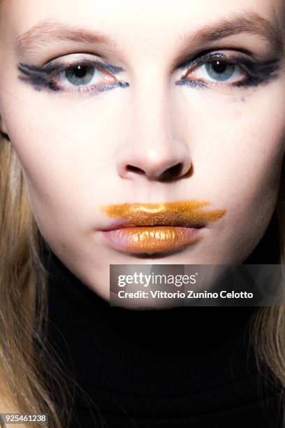 Model prepares backstage before the Guy Laroche show as part of the Paris Fashion Week Womenswear Fall/Winter 2018/2019 on February 28, 2018 in...