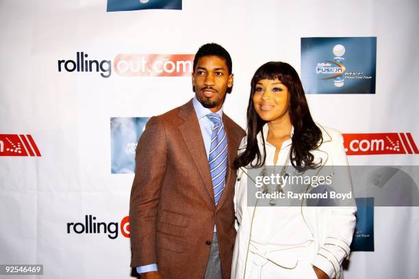 Entertainer Farnsworth Bentley and actress LisaRaye McCoy walks the red carpet at The Shrine in Chicago, Illinois on October 26, 2009.