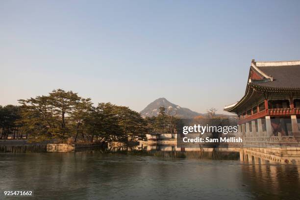 The peacful Gyeonghoeru Pavilion and pond at the Gyeongbokgung Palace on 26th February 2018 in Seoul, South Korea. Gyeongbokgung, also known as...