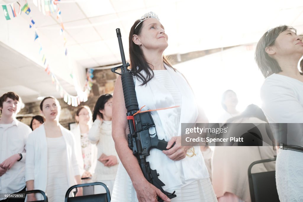 World Peace And Unification Sanctuary Religious Group Holds Blessing Ceremony For Couples And Their AR-15 Rifles