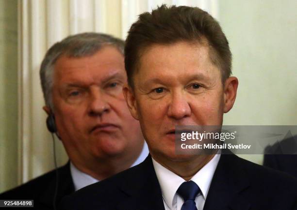 Gazprom's CEO Alexei Miller and Roneft's President Igor Sechin attend Russian-Austrian talks at the Kremlin on February 28, 2018 in Moscow, Russia....