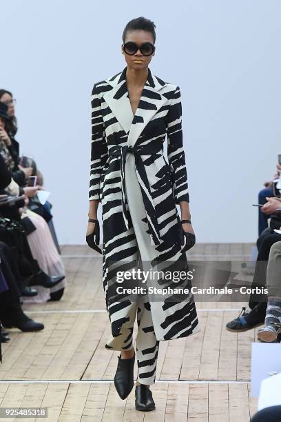 Model walks the runway during the Guy Laroche show as part of the Paris Fashion Week Womenswear Fall/Winter 2018/2019 on February 28, 2018 in Paris,...