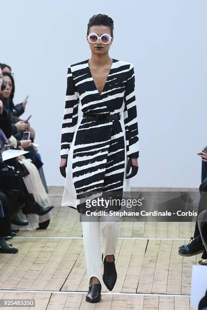 Model walks the runway during the Guy Laroche show as part of the Paris Fashion Week Womenswear Fall/Winter 2018/2019 on February 28, 2018 in Paris,...