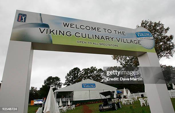 Storm clouds move in over the Viking Culinary Village after first round play was postponed again because of weather in the Viking Classic at the...