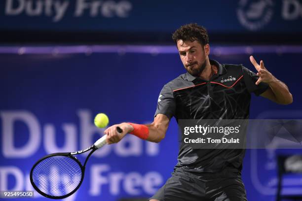 Robin Haase of Netherlands plays a forehand during his match against Malek Jaziri of Tunisia on day three of the ATP Dubai Duty Free Tennis...