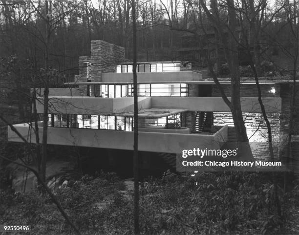 Exterior view of the Edgar Kaufmann residence in Mill Run, Pennsylvania, known as "Fallingwater", December 1937. Designed by Frank Lloyd Wright, the...