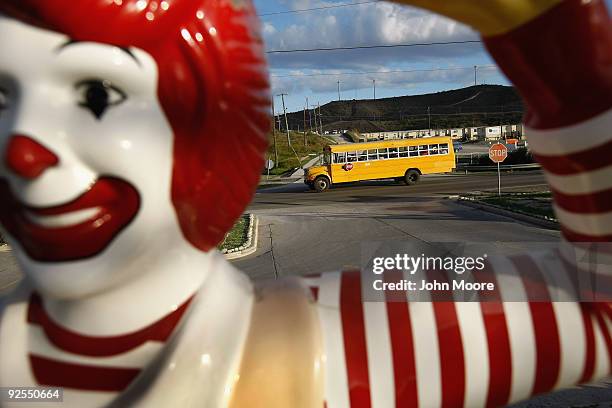 School bus passes a McDonald's at the U.S. Naval Base on October 29, 2009 at Guantanamo Bay, Cuba. The base, currently best known for hosting the...