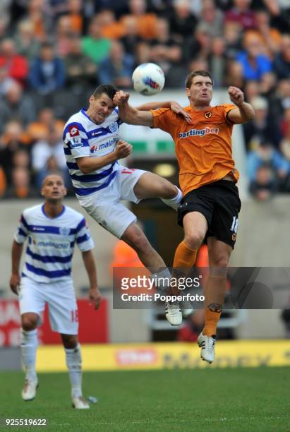 Joey Barton of Queens Park Rangers and Sam Vokes of Wolves in action during the Barclays Premier League match between Wolverhampton Wanderers and...