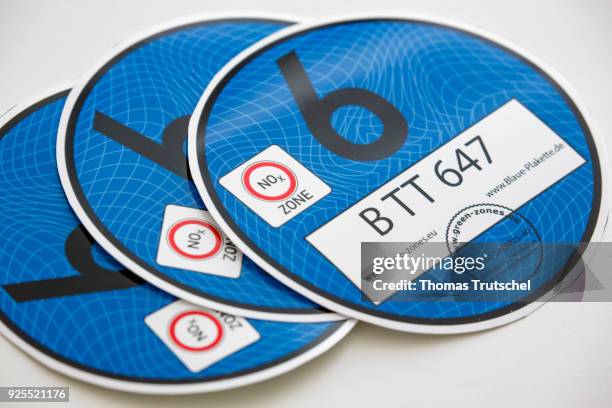 Berlin, Germany Blue plaques to regulate diesel driving bans are on a table on February 28, 2018 in Berlin, Germany.