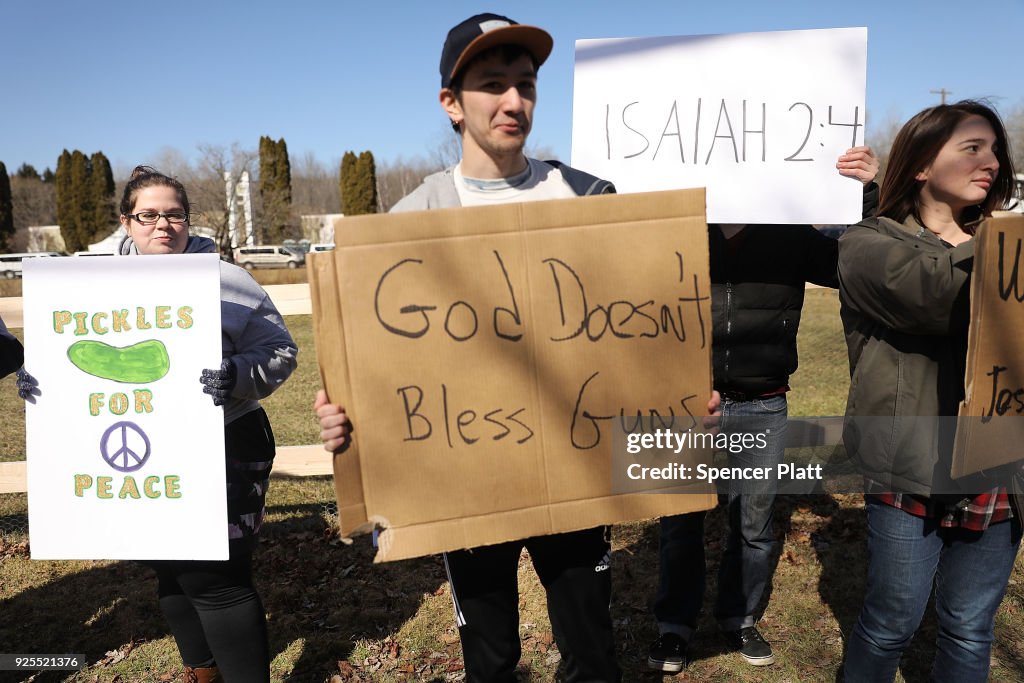 World Peace And Unification Sanctuary Religious Group Holds Blessing Ceremony For Couples And Their AR-15 Rifles