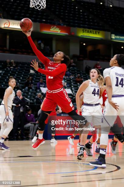 Wisconsin Badgers forward Marsha Howard drives down the lane and goes in for two during the game between the Wisconsin Badgers and Northwestern...