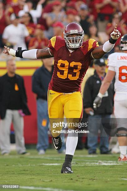 Everson Griffen of the USC Trojans celebrates a fumble recovery against the Oregon State Beavers on October 24, 2009 at the Los Angeles Coliseum in...