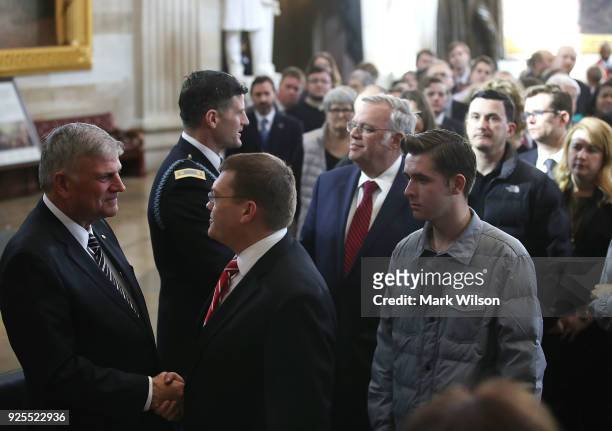 Franklin Graham , greets members of the public in the Rotunda of the U.S. Capitol, after they viewed the casket containing the remains of evangelist...
