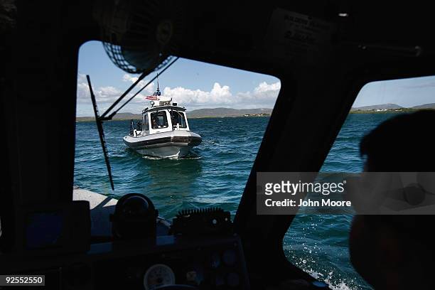 Navy patrol boats pull alongside each other October 29, 2009 at the U.S. Naval Base at Guantanamo Bay, Cuba. The base, currently best known for...