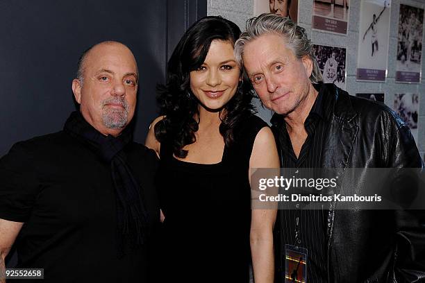 Billy Joel, Catherine Zeta-Jones and Michael Douglas attend the 25th Anniversary Rock & Roll Hall of Fame Concert at Madison Square Garden on October...