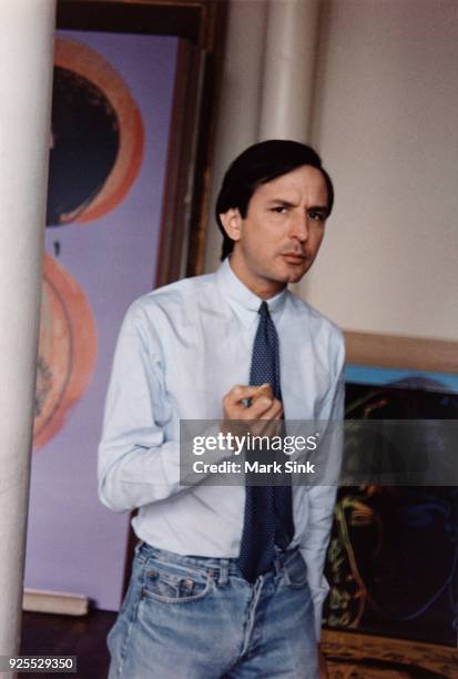 Portrait of Andy Warhol's business manager. Frederick Hughes eats on the go at The Factory, September 13, 1981 at 860 Broadway, New York City, New...
