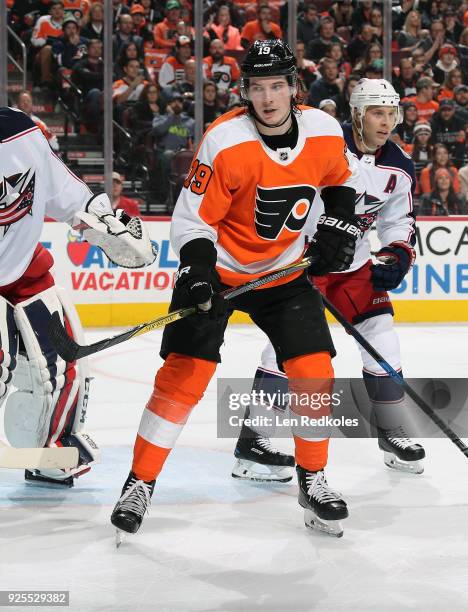 Nolan Patrick of the Philadelphia Flyers positions himself against Jack Johnson of the Columbus Blue Jackets on February 22, 2018 at the Wells Fargo...