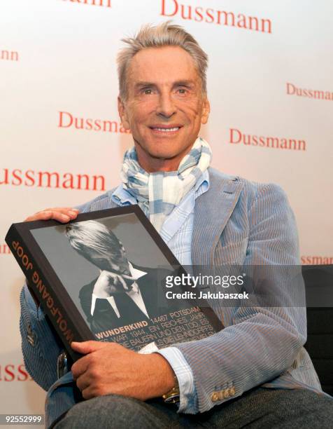 German designer Wolfgang Joop poses for the media during a book presentation of 'Wolfgang Joop: Wunderkind' at the Dussmann book store on October 30,...