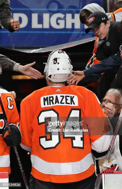 Petr Mrazek of the Philadelphia Flyers walks through his fans after being named the second star of the game after defeating the Columbus Blue Jackets...