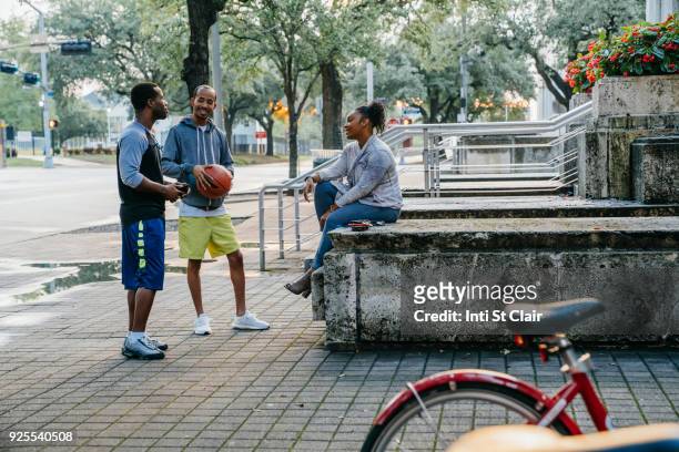 black friends with basketball hanging out - houston texas people stock pictures, royalty-free photos & images