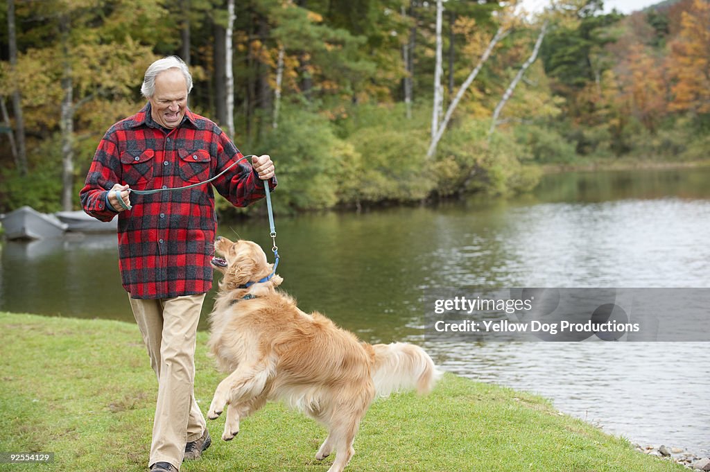 Boomer Man Walking his Dog