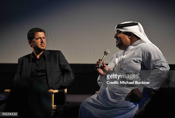 Director Peter Webber and actor Hafiz Ali Ali speak onstage at DOHA TALKS: Qatar on Film - The Scents of Shadows and Jasim at the Museum of Islamic...