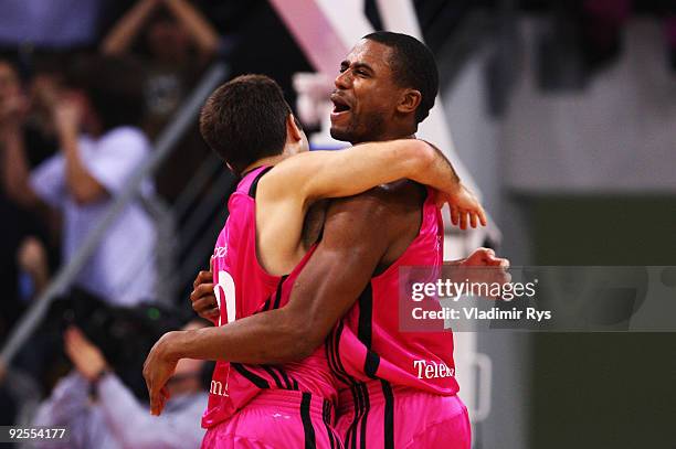 Jared Jordan and Bryce Taylor of Baskets celebrate after winning the Beko Basketball Bundesliga game between Telekom Baskets and Alba Berlin at...