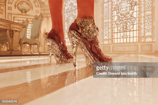 feet of woman wearing clear high heel shoes - glamour stock pictures, royalty-free photos & images