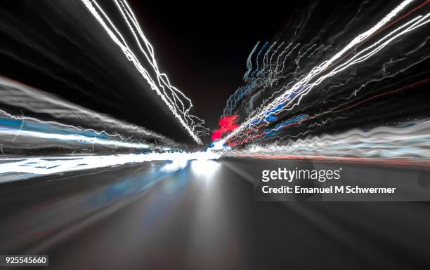 driving fast in berlin - looking backwards - long exposure - punto di vista del guidatore foto e immagini stock