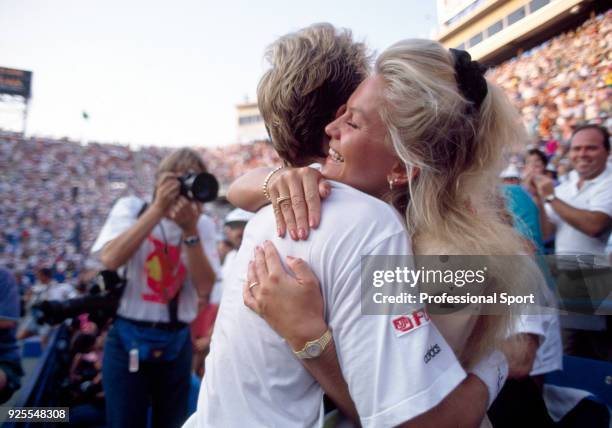 Stefan Edberg of Sweden hugging girlfriend Annette Olsen in celebration after defeating Jim Courier of the USA in the Men's Singles Final of the US...
