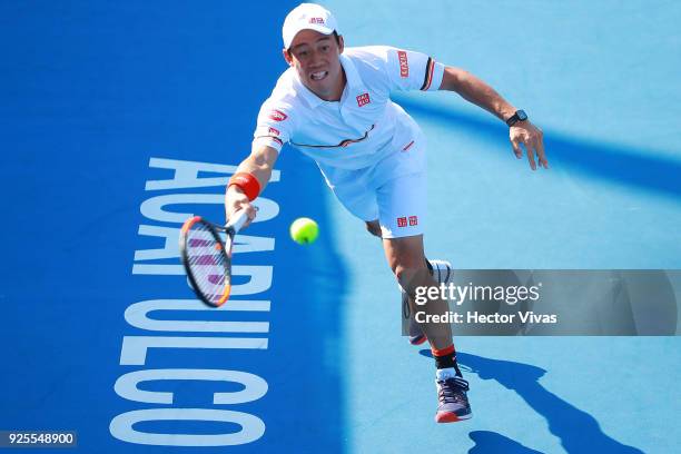 Kei Nishikori of Japan takes a forehand shot during a match between Kei Nishikori of Japan and Denis Shapovalov of Canada as part of the Telcel...