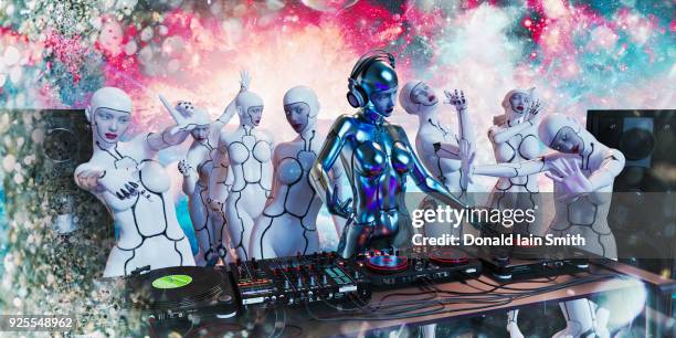 robots dancing to music by robot woman disc jockey - dj stockfoto's en -beelden