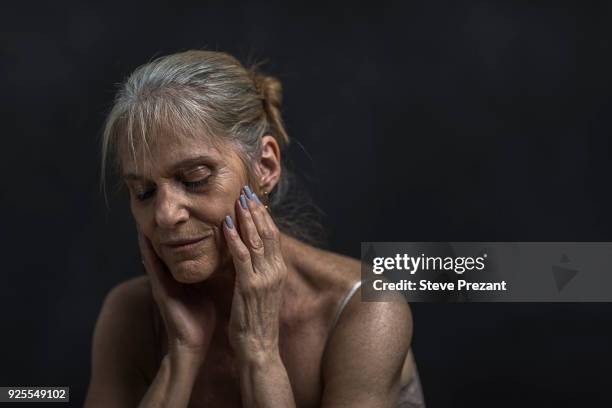 portrait of pensive older caucasian woman - steve prezant stock pictures, royalty-free photos & images