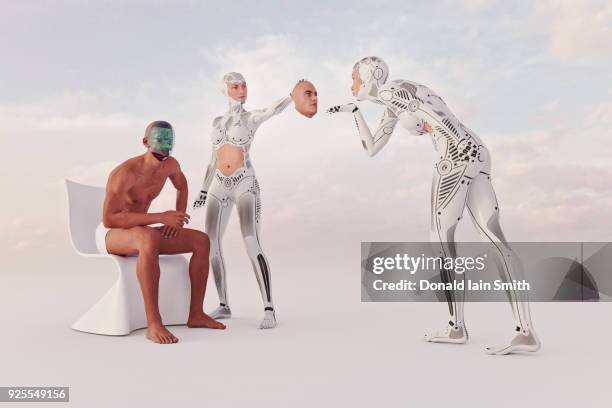 futuristic woman removing face of robot man revealing circuits - blowing a kiss imagens e fotografias de stock